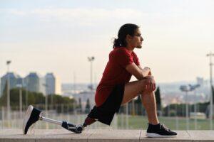 Athletic man with a disability exercising outdoors.